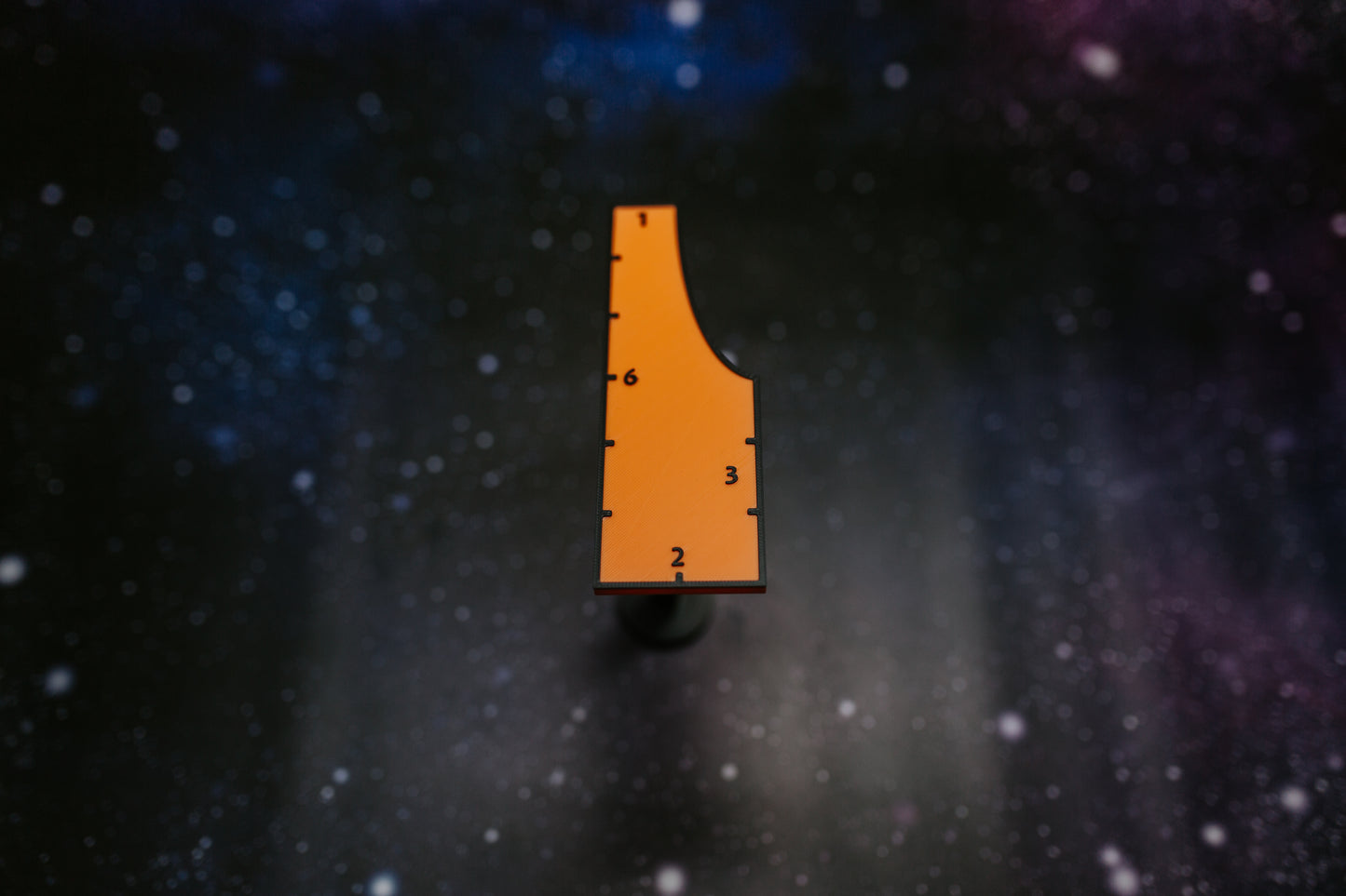 6-inch combat and movement gauge for tabletop wargame measuring in orange and black