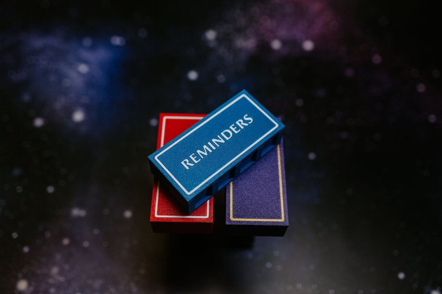 3 Sci-Fi Universal token set stacked on each other